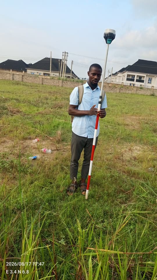 Geokreate surveyor carrying GNSS equipment on a project site